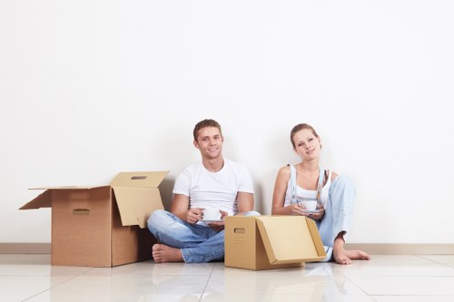 Packed boxes and household items ready for urgent removals in Kingston Vale