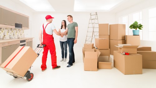 Careful unpacking and room organisation after a local move in Kingston Vale