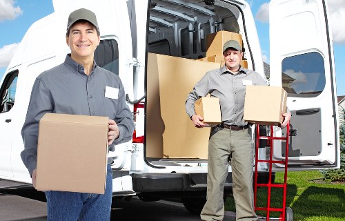 Local movers handling household furniture in Kingston Vale