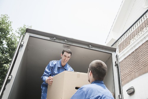Loading furniture and boxes into a removal van for Kingston Vale customers